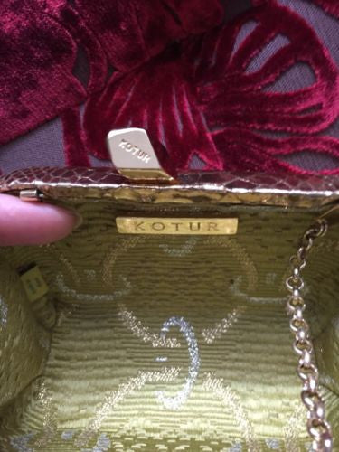Kotur Ltd Italy Gold Snakeskin Knot Clutch