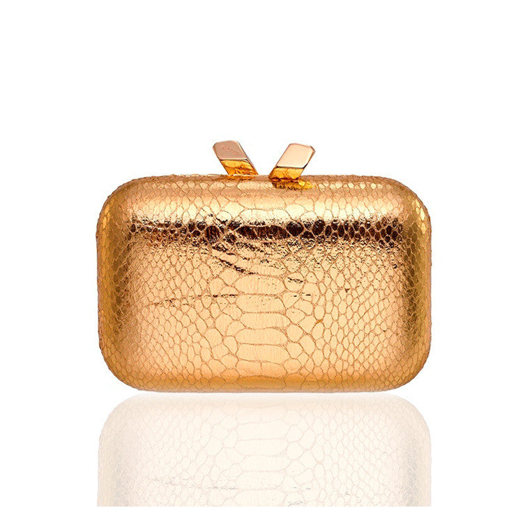 Kotur Ltd Italy Gold Snakeskin Knot Clutch